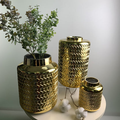Goldene Vase aus Glas mit Relief